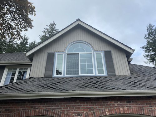 Arched window replacement in a gable dormer on a Redmond, WA home