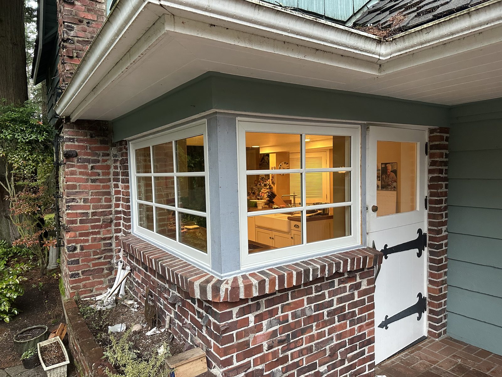 Bay window on a brick Bellevue home, replaced by Window Fellas