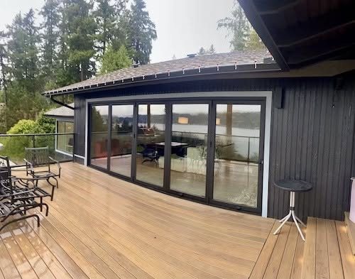 Moving glass wall opening onto a deck at an Issaquah, WA home