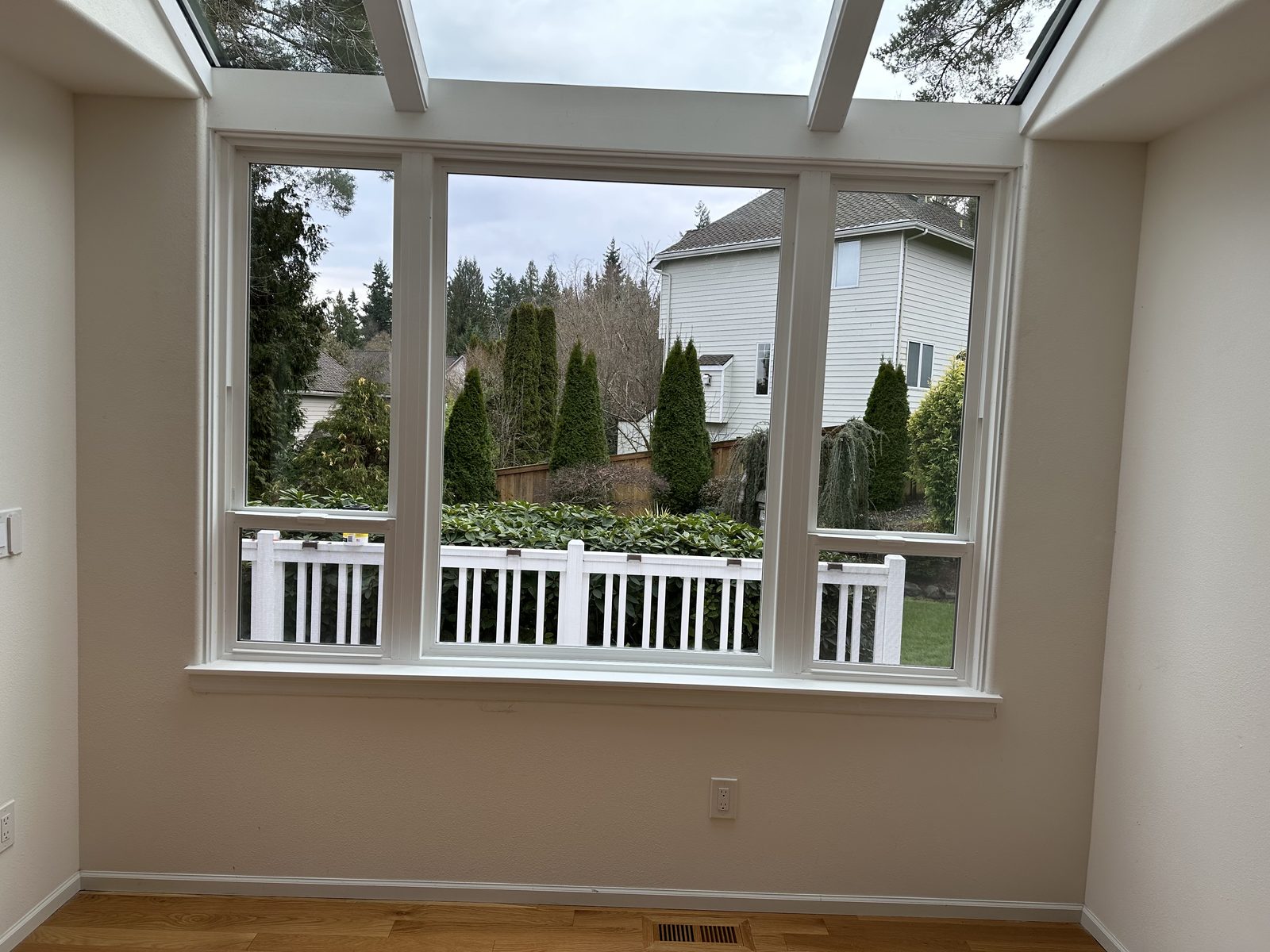 Redmond skywall interior after replacement — white frames and clear glass