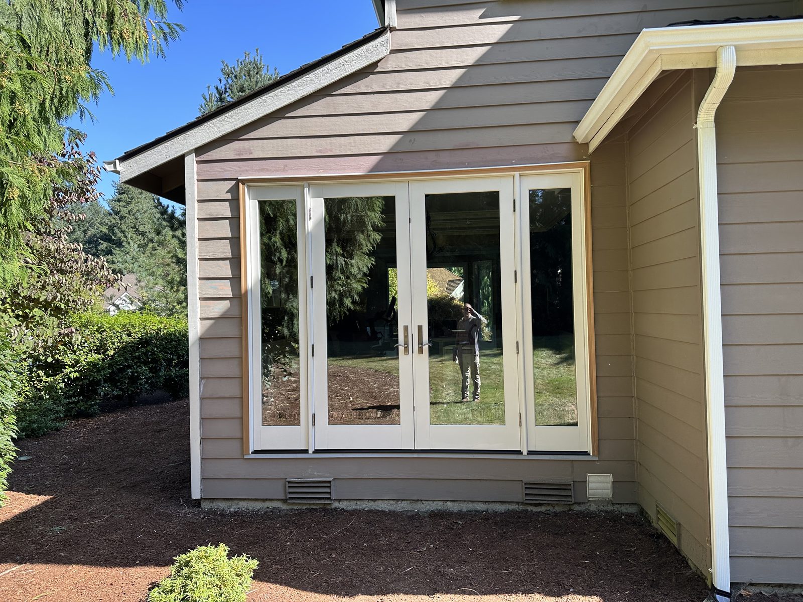 White French patio doors installed on a Sammamish home